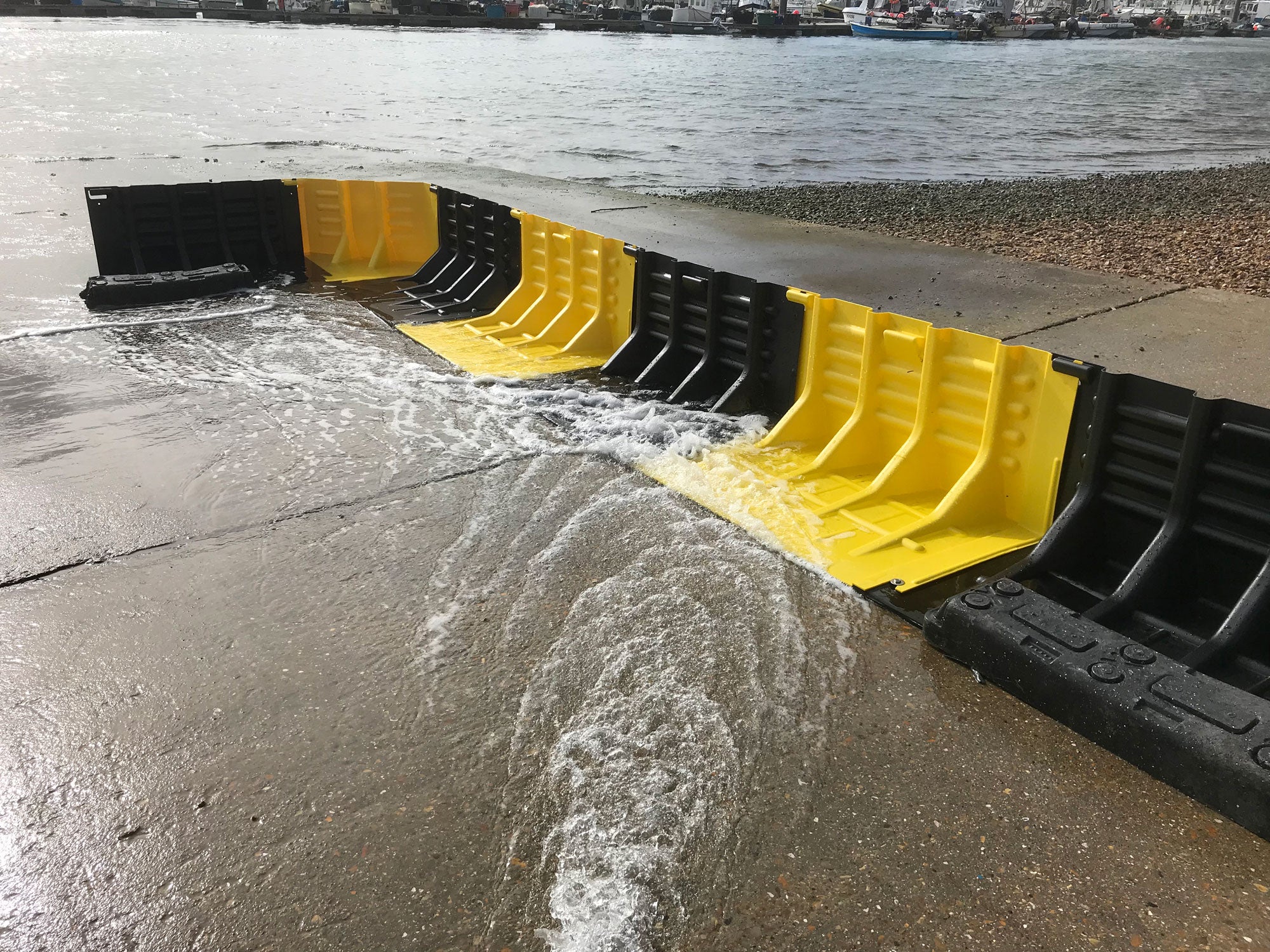 FloodFence Lightweight diverting water back into a river