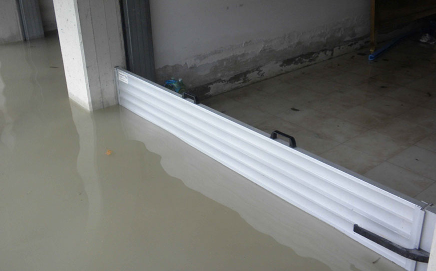 Aquastop barrier preventing water entering a garage of a household