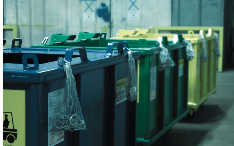 Different coloured skips